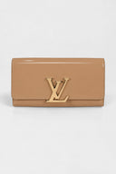 Louis Vuitton • Louise Clutch in Noisette Vernis