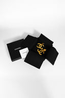 Chanel • CC Paris Button Drop Earrings in Gold